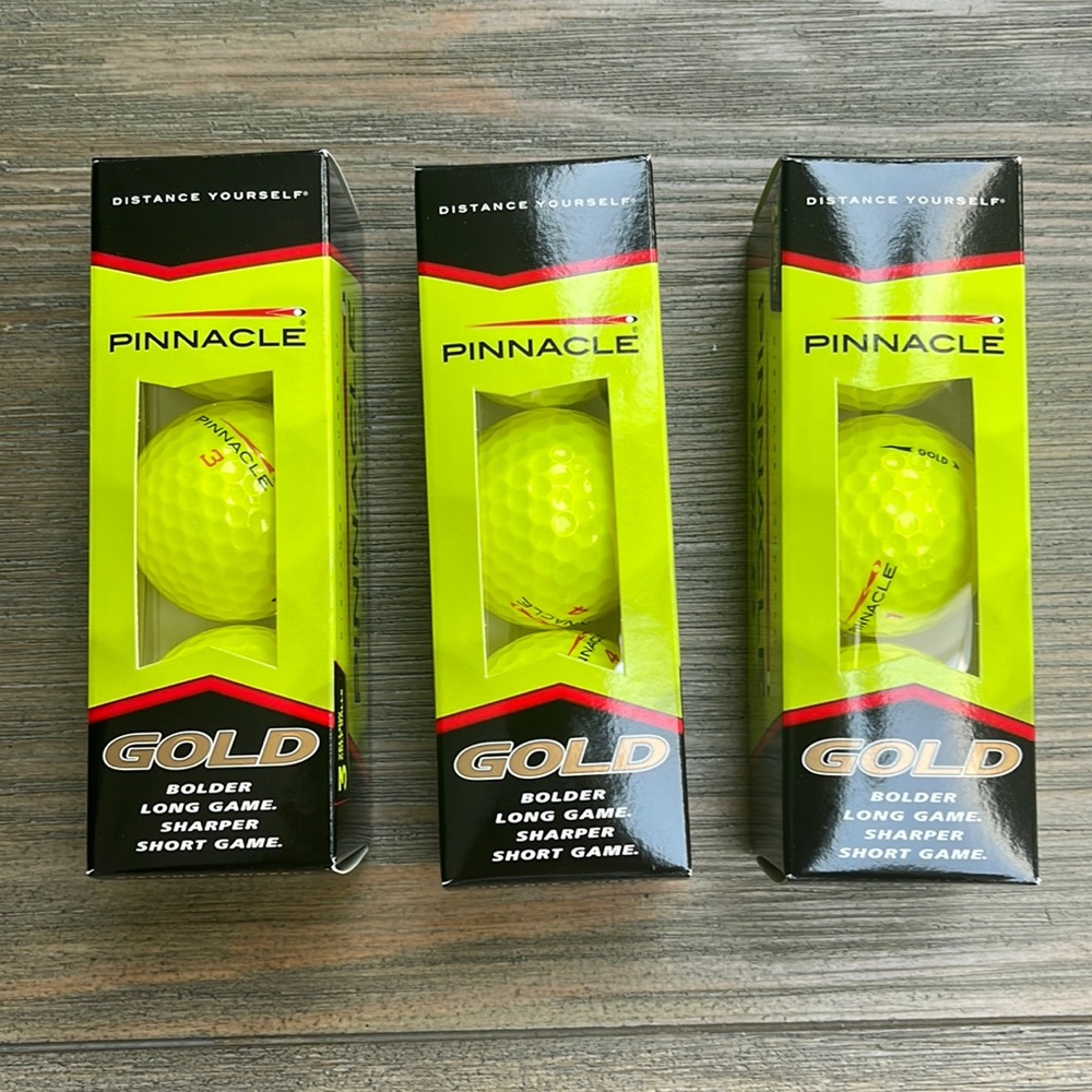 Pinnacle gold golf balls, 3 boxes with 3 balls per box.